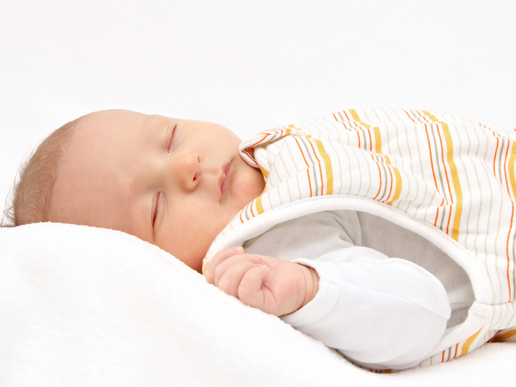 Baby asleep in baby sleeping bag