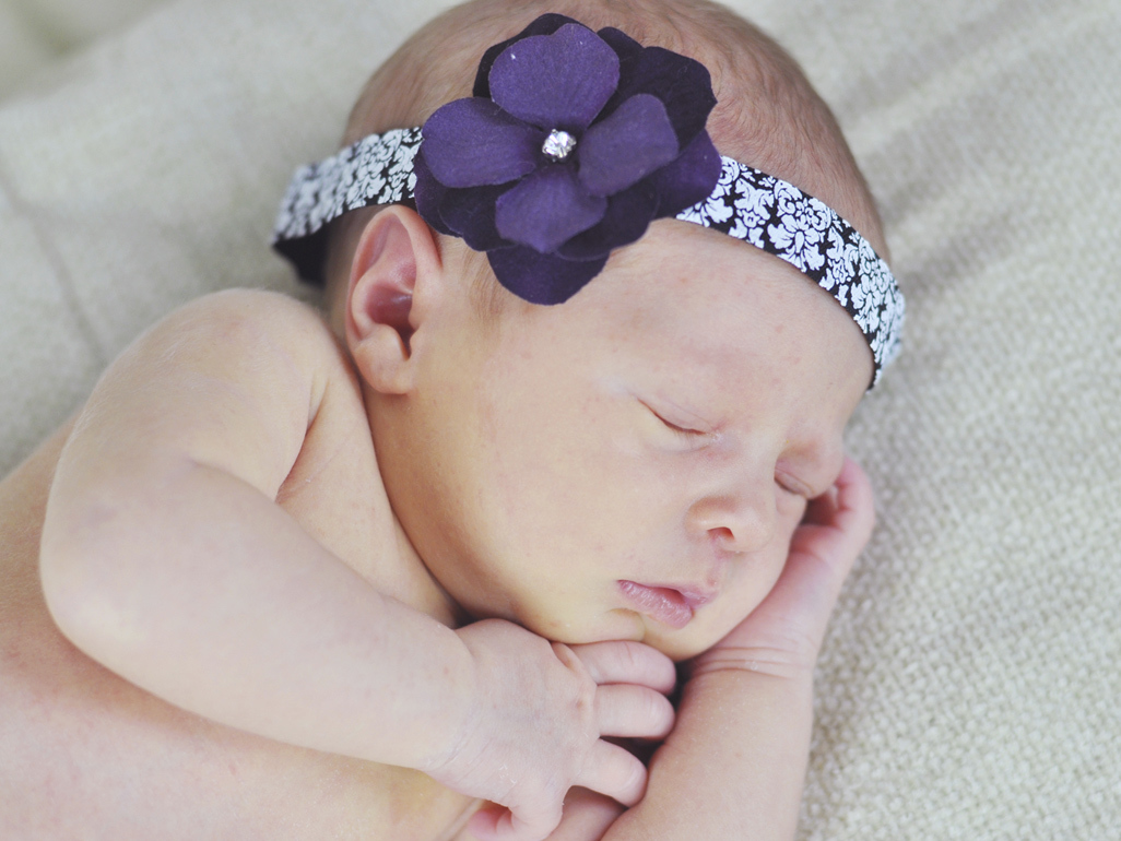 Baby with flower headband