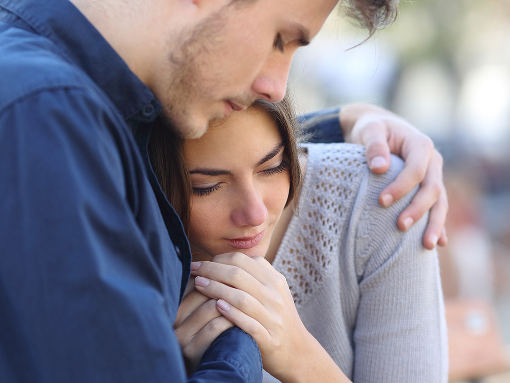 Couple looking emotional