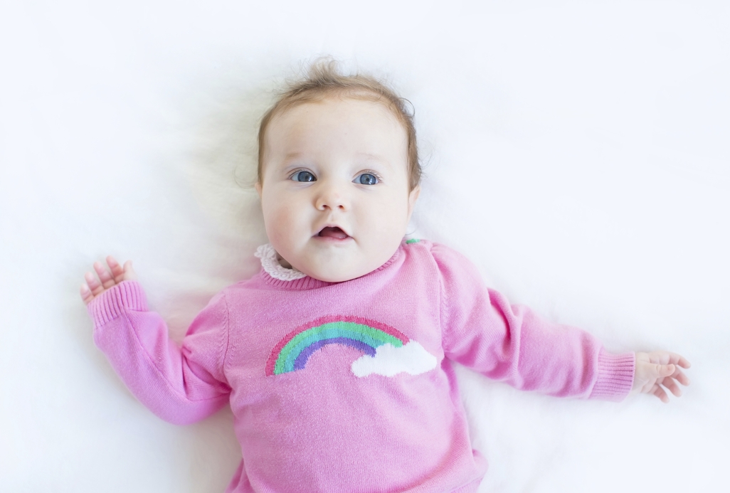 baby with pink jumper