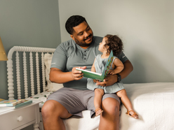 2 year old girl reading book