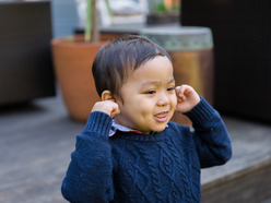 Toddler boy singing
