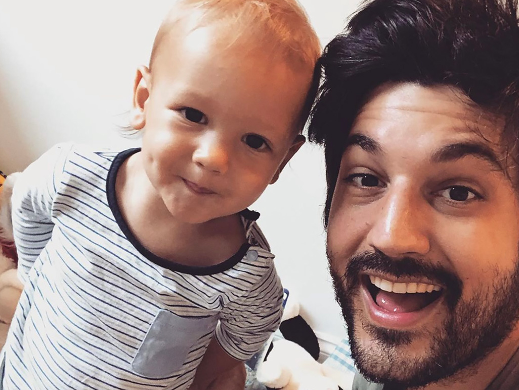 Tom and with toddler both smiling