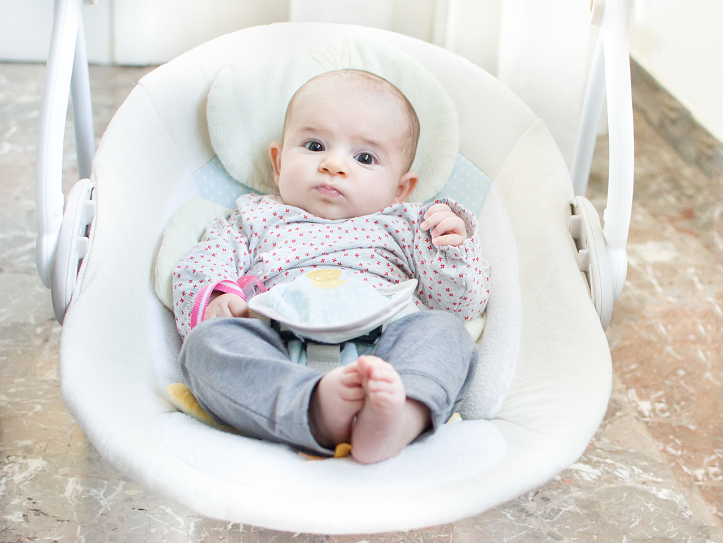 Baby in a baby swing