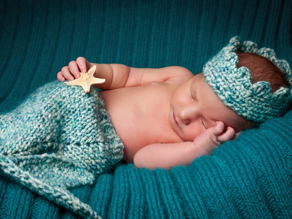 Baby dressed as a mermaid