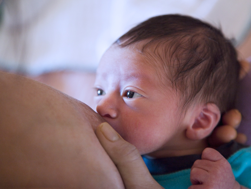 Baby being breastfed