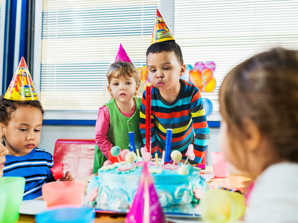 Children in party hats